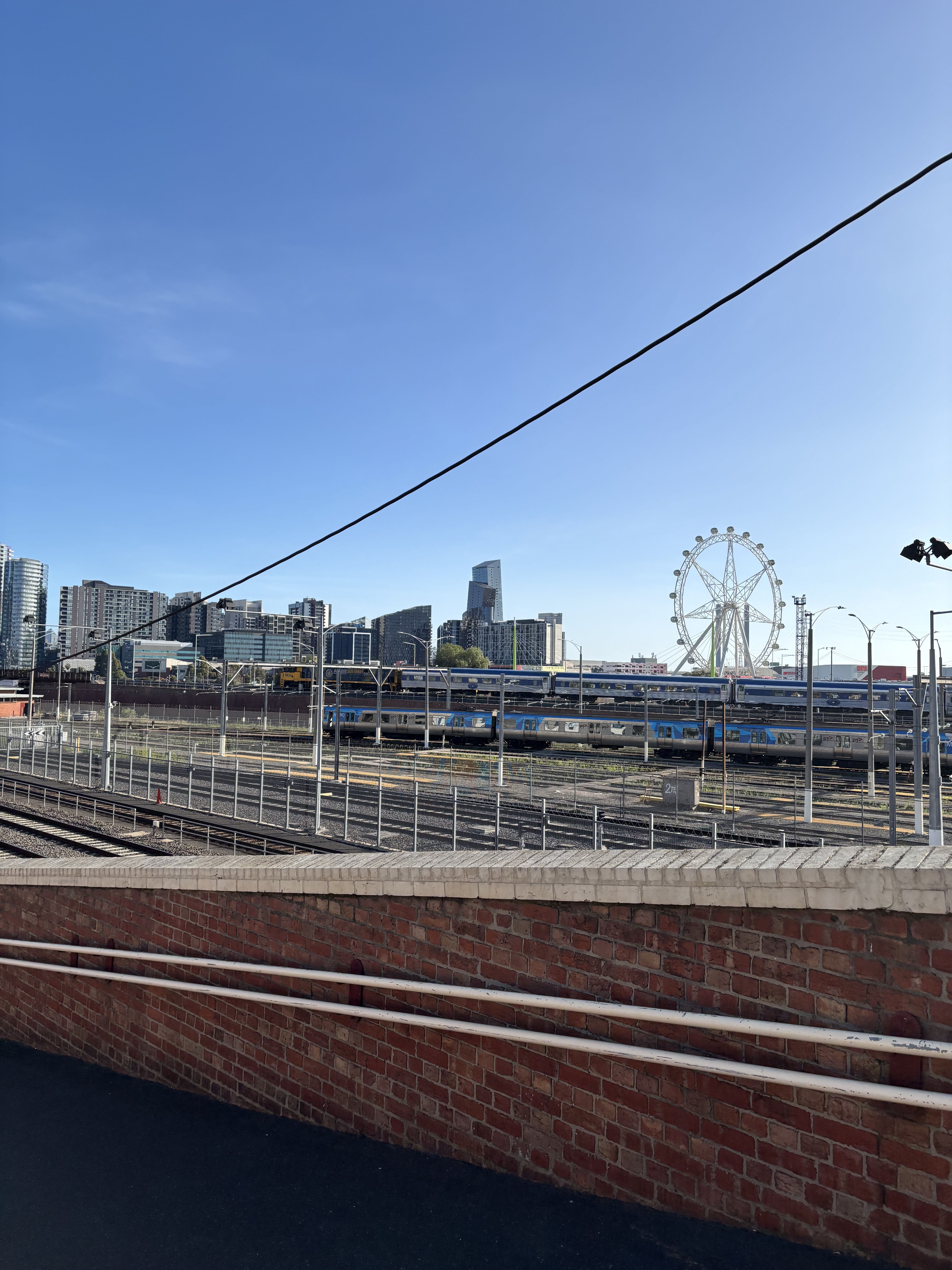 The view from North Melbourne station over looking the Melbourne Eye ferris wheel. 